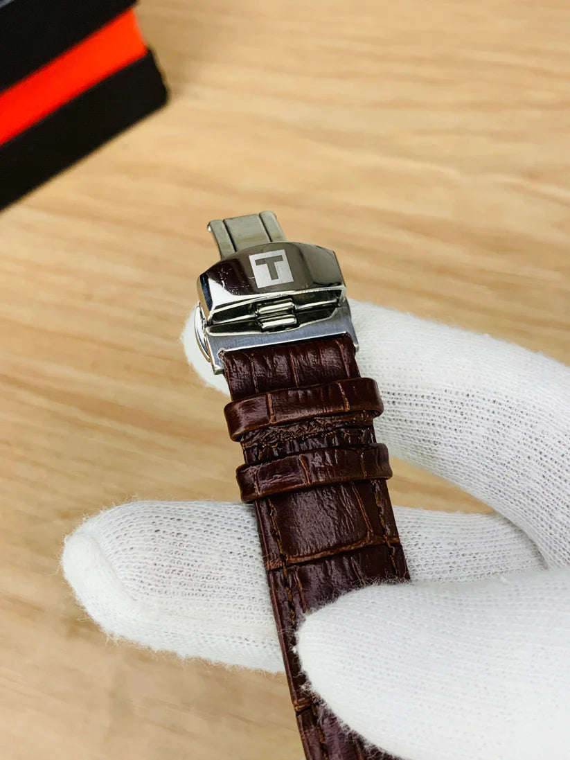 Classic Chronograph Watch with Textured Leather Strap and Multifunction Dial